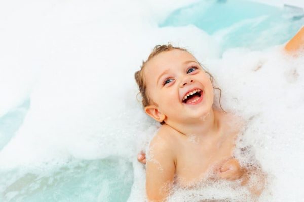 little-girl-takes-bath-hydromassage-bathtub_87414-4294